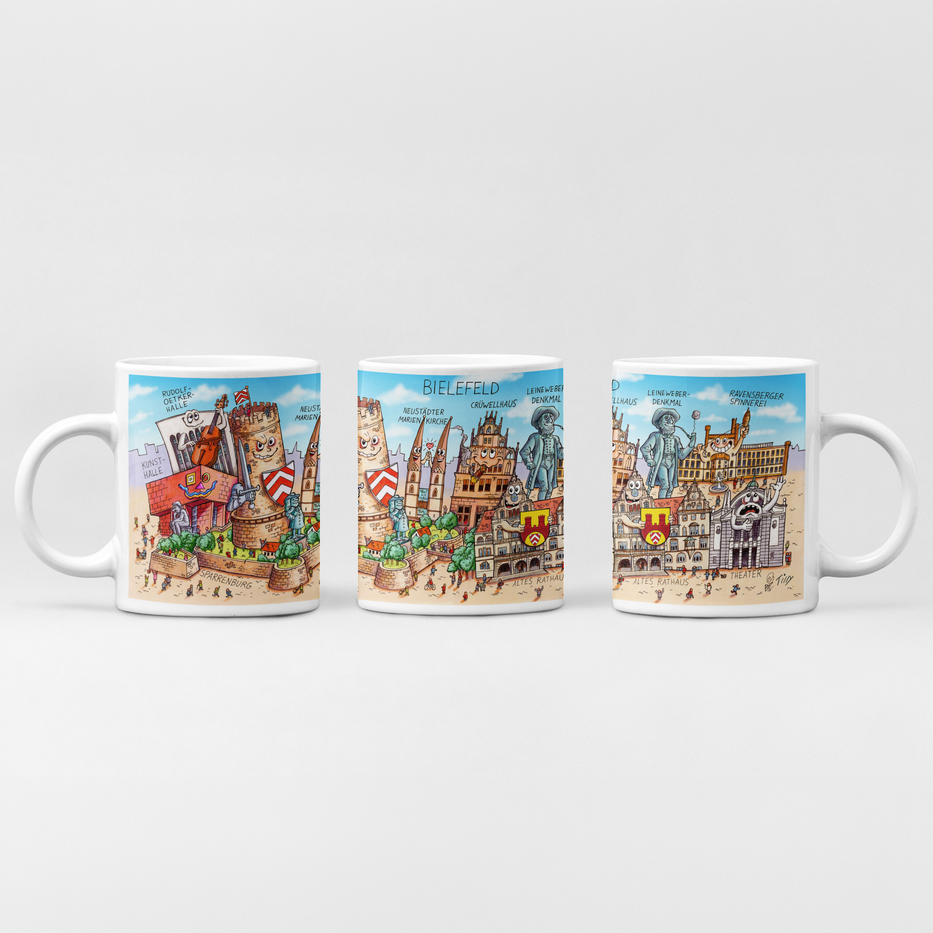 Bielefeld Tasse mit buntem Stadtmotiv von Jacques Tilly vor weißem Hintergrund.