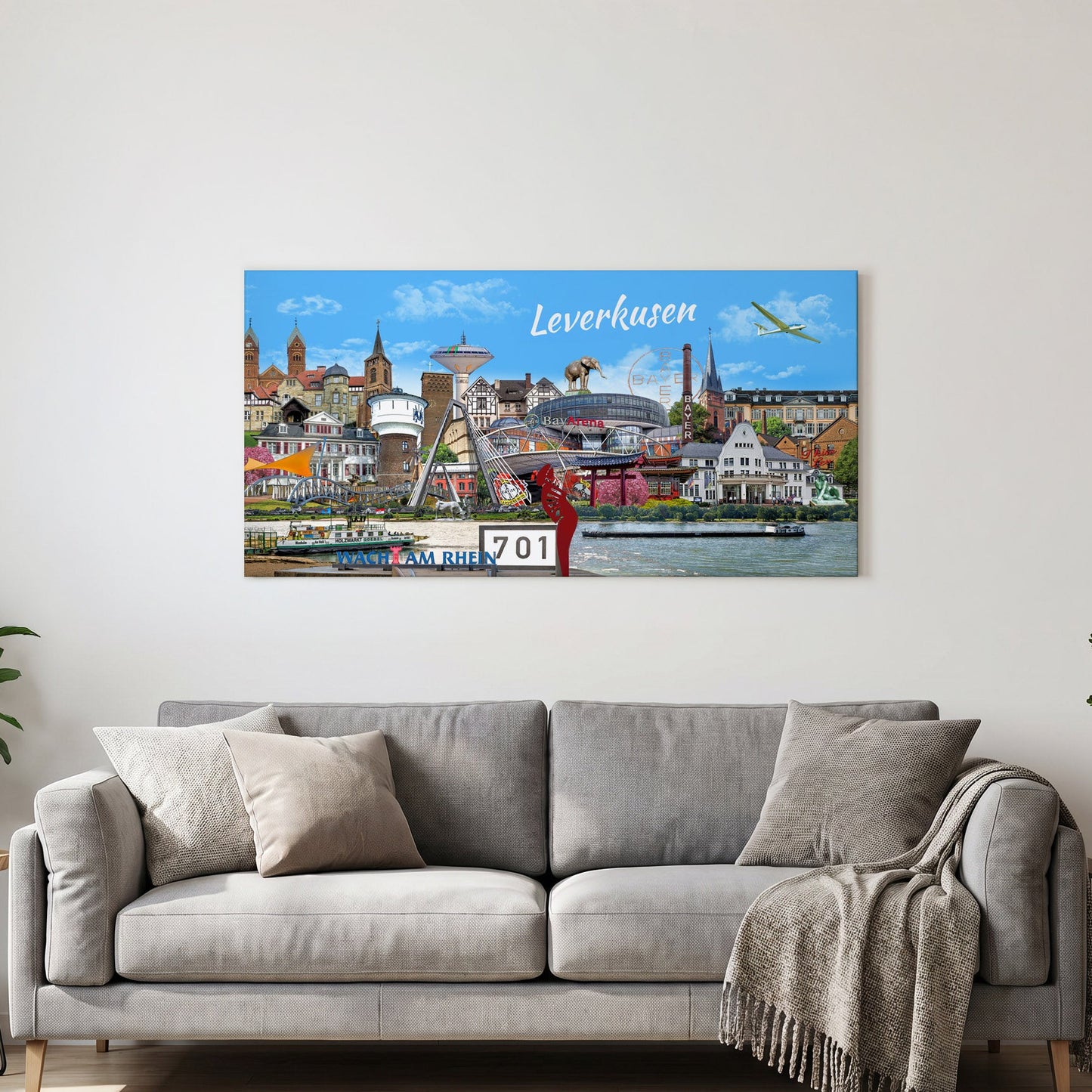 Großes Wandbild mit Leverkusen Skyline im modernen Wohnzimmer über dem Sofa