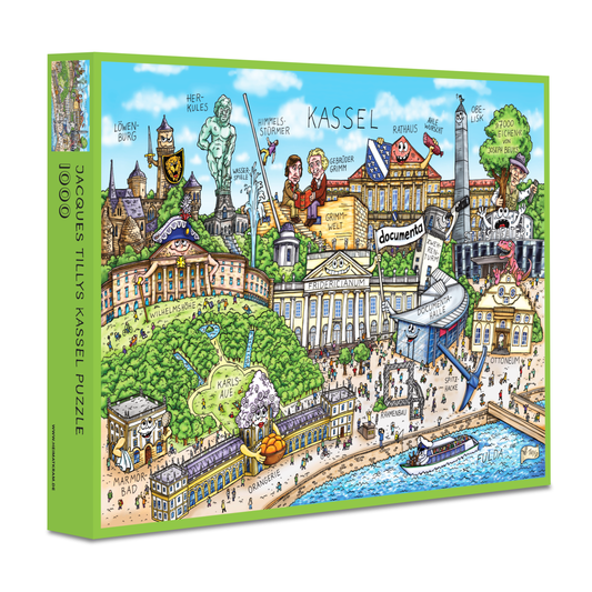 Grüne Produktverpackung des 1000-Teile Kassel Puzzles von Jacques Tilly mit dem vollständigen farbigen Stadtmotiv.