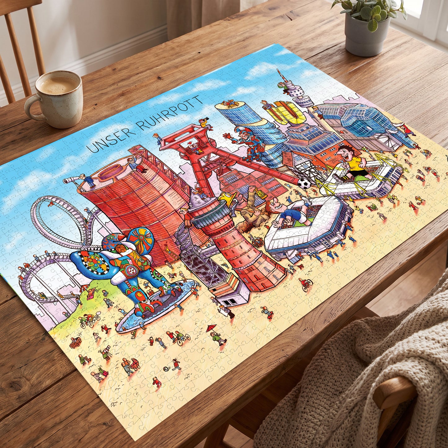 Fertig gelegtes Ruhrpott Puzzle auf einem Holztisch neben einer Kaffeetasse.